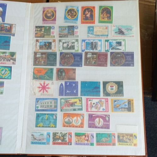142 - Brown Lighthouse 16 page/32 sides stockbook - with mostly un-mounted mint selections.  Mostly Pacifi... 