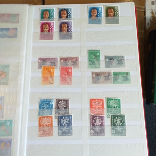 143 - Red Lighthouse 24 page/48 sides stockbook with mostly un-mounted mint selections.  Mostly Pacific/Ca... 