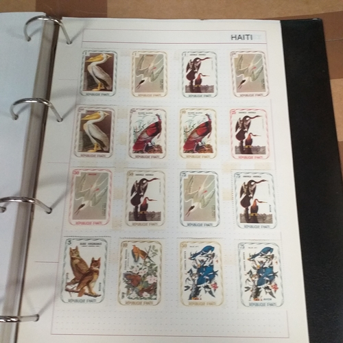 126 - South & Central American Countries collection in a 4 ring binder, mint used includes Bolivia, Domini... 