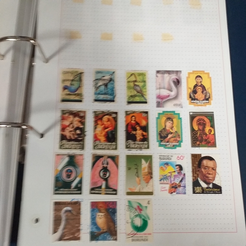 128 - African Countries in a 4 ring binder including Benin, Burkina Faso, Burundi, Congo, Equatorial Guine... 