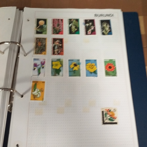 128 - African Countries in a 4 ring binder including Benin, Burkina Faso, Burundi, Congo, Equatorial Guine... 