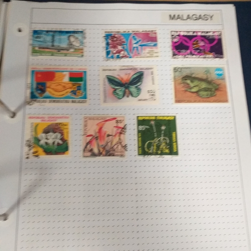 128 - African Countries in a 4 ring binder including Benin, Burkina Faso, Burundi, Congo, Equatorial Guine... 