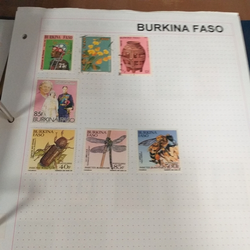 128 - African Countries in a 4 ring binder including Benin, Burkina Faso, Burundi, Congo, Equatorial Guine... 