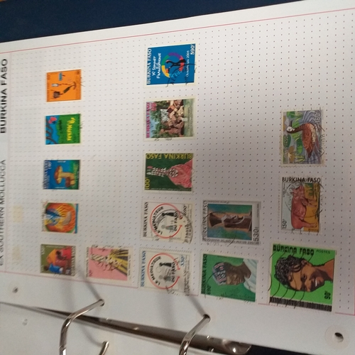 128 - African Countries in a 4 ring binder including Benin, Burkina Faso, Burundi, Congo, Equatorial Guine... 