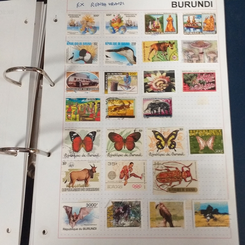 128 - African Countries in a 4 ring binder including Benin, Burkina Faso, Burundi, Congo, Equatorial Guine... 
