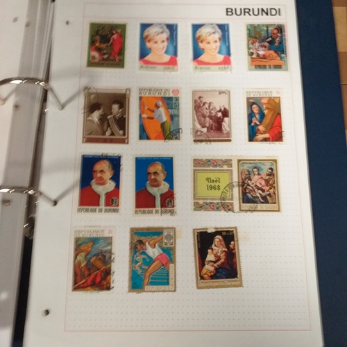 128 - African Countries in a 4 ring binder including Benin, Burkina Faso, Burundi, Congo, Equatorial Guine... 