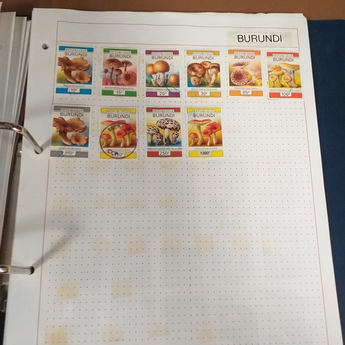 128 - African Countries in a 4 ring binder including Benin, Burkina Faso, Burundi, Congo, Equatorial Guine... 