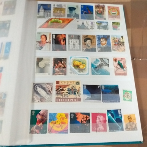 131 - 5 X W H Smith 8 page 16 side stock books with World stamps mint and used, includes GB, viewing requi... 