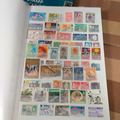 132 - 4 x W H Smith plus a Fil-i-Safe 8 page 16 side stock books with World stamps mint and used, includes... 
