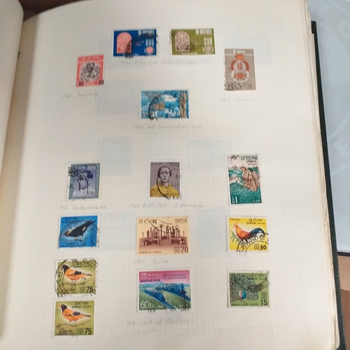 134 - World collection in 2 x Devon albums from early to approx 1980  and a WH Smith Collecta series album... 