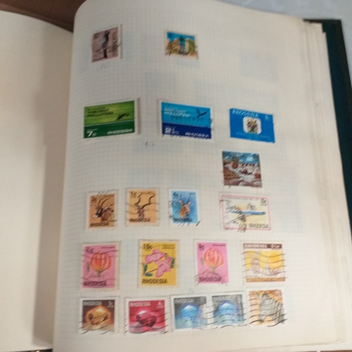 134 - World collection in 2 x Devon albums from early to approx 1980  and a WH Smith Collecta series album... 