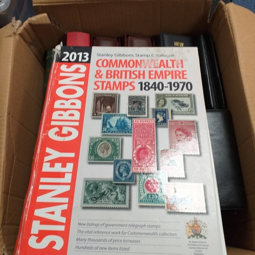 113 - Box of empty albums etc - 4 x small FD, 2 x Royal Mail Presentation Pack albums, Windsor album, Red ... 