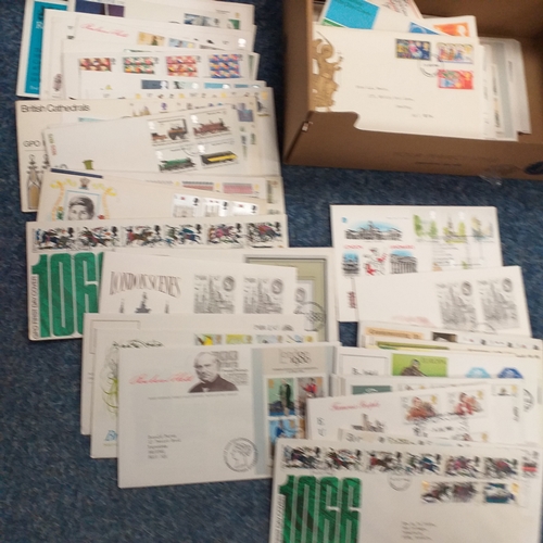 91 - Shoe box containing over 130 GB FDC's, many with special postmarks, all in good condition.