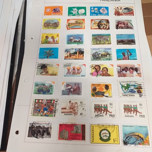49 - Tanganika / Tanzania collection on 20+ album pages / stock cards, single sheet of KGV issues with va... 