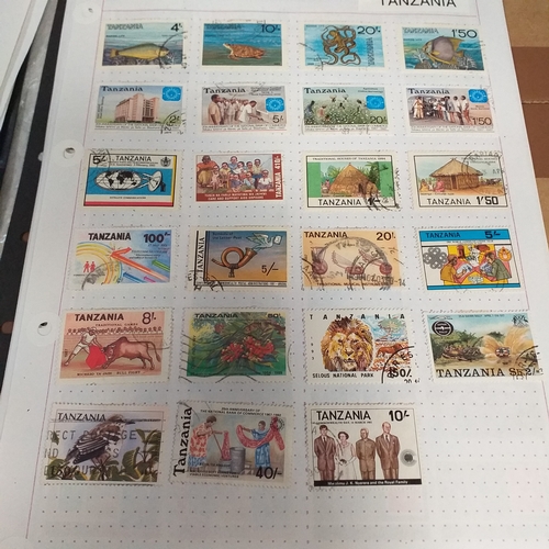 49 - Tanganika / Tanzania collection on 20+ album pages / stock cards, single sheet of KGV issues with va... 