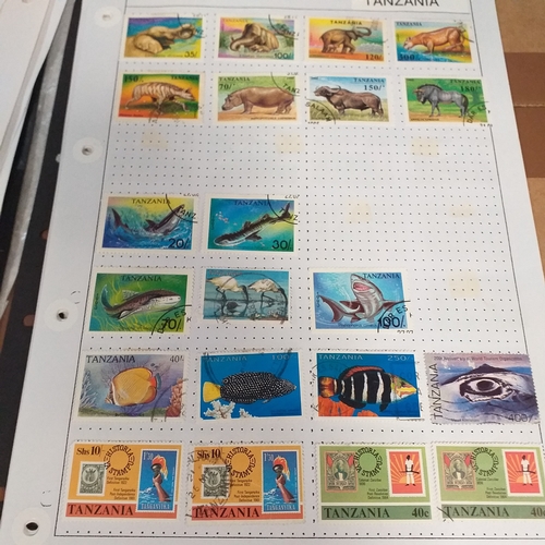 49 - Tanganika / Tanzania collection on 20+ album pages / stock cards, single sheet of KGV issues with va... 