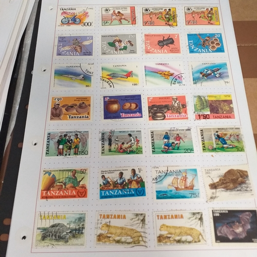 49 - Tanganika / Tanzania collection on 20+ album pages / stock cards, single sheet of KGV issues with va... 