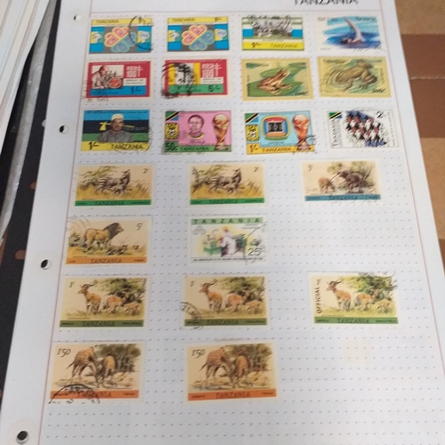 49 - Tanganika / Tanzania collection on 20+ album pages / stock cards, single sheet of KGV issues with va... 