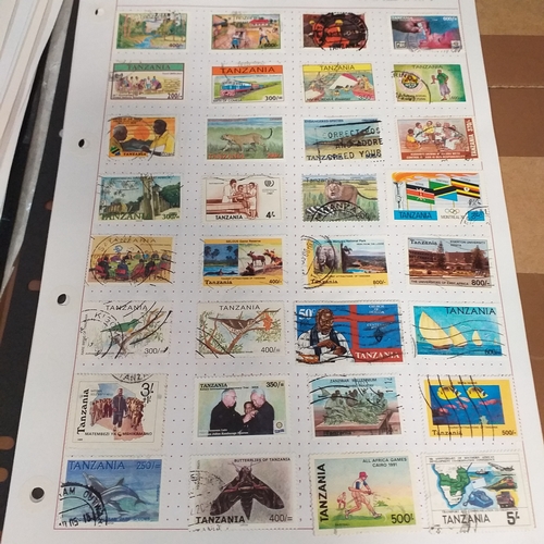 49 - Tanganika / Tanzania collection on 20+ album pages / stock cards, single sheet of KGV issues with va... 