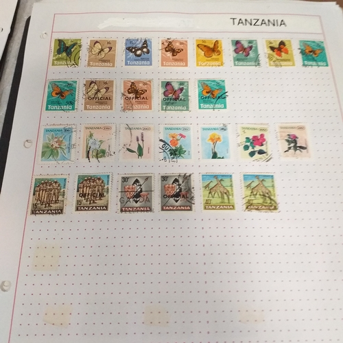 49 - Tanganika / Tanzania collection on 20+ album pages / stock cards, single sheet of KGV issues with va... 