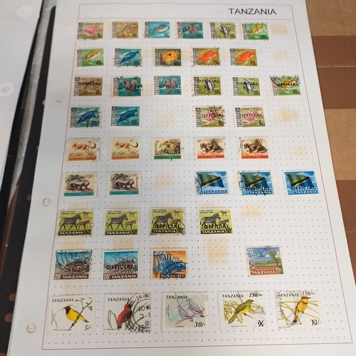 49 - Tanganika / Tanzania collection on 20+ album pages / stock cards, single sheet of KGV issues with va... 