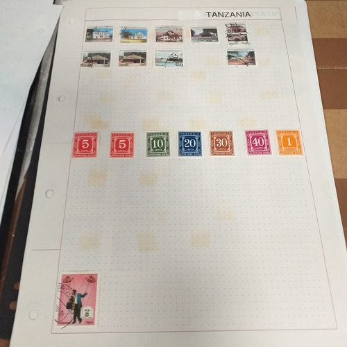 49 - Tanganika / Tanzania collection on 20+ album pages / stock cards, single sheet of KGV issues with va... 