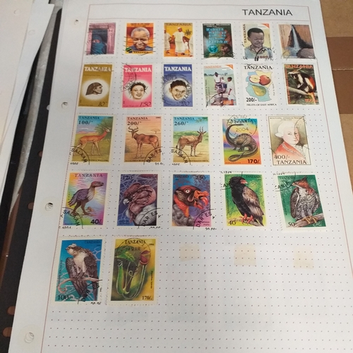 49 - Tanganika / Tanzania collection on 20+ album pages / stock cards, single sheet of KGV issues with va... 