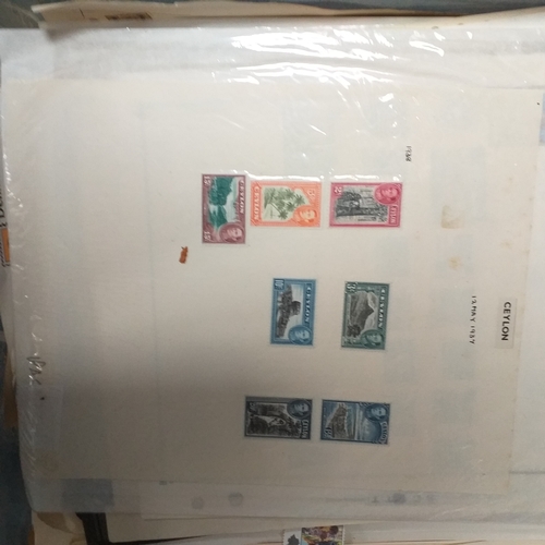29 - Box of album leaves - 100's mostly Commonwealth, some foreign - viewing required