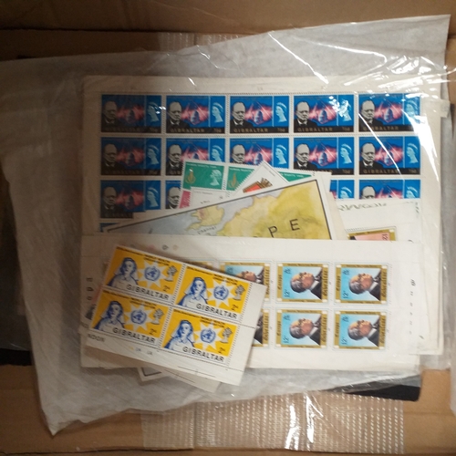 1 - Box containing a huge selection of stamps on leaves and album pages, collections a number of which a... 