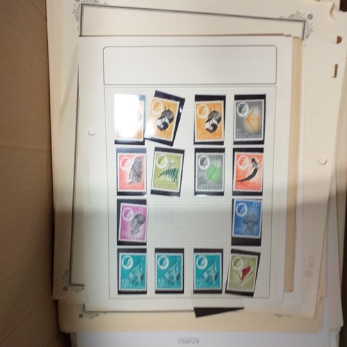 1 - Box containing a huge selection of stamps on leaves and album pages, collections a number of which a... 
