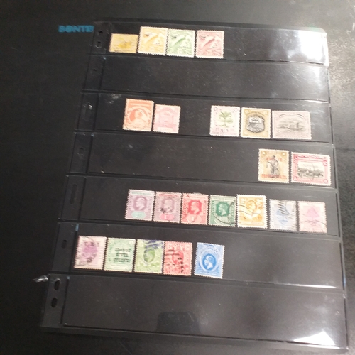 1 - Box containing a huge selection of stamps on leaves and album pages, collections a number of which a... 