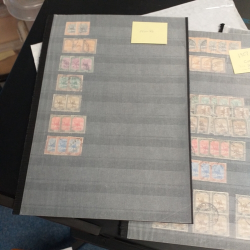 1 - Box containing a huge selection of stamps on leaves and album pages, collections a number of which a... 