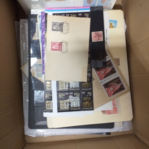 1 - Box containing a huge selection of stamps on leaves and album pages, collections a number of which a... 