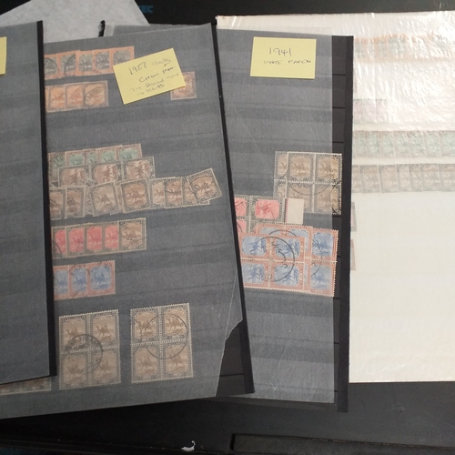 1 - Box containing a huge selection of stamps on leaves and album pages, collections a number of which a... 