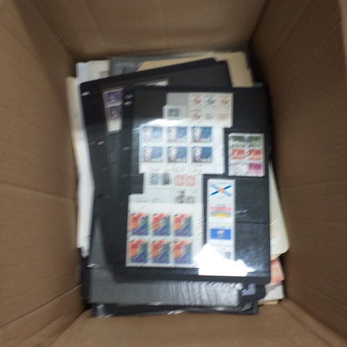 1 - Box containing a huge selection of stamps on leaves and album pages, collections a number of which a... 