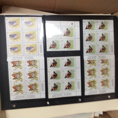 1 - Box containing a huge selection of stamps on leaves and album pages, collections a number of which a... 