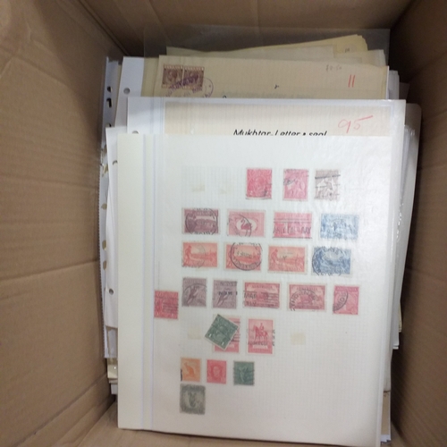 1 - Box containing a huge selection of stamps on leaves and album pages, collections a number of which a... 