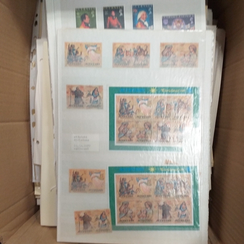 1 - Box containing a huge selection of stamps on leaves and album pages, collections a number of which a... 