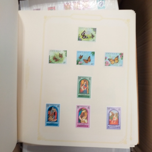 1 - Box containing a huge selection of stamps on leaves and album pages, collections a number of which a... 