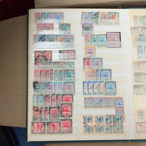 14 - Glory box - albums and stock books, box of loose stamps on/off paper, stock cards etc, empty album a... 