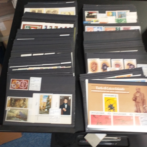 15 - Small box containing 250+/-  3 row stock cards with world sets and singles, all identified and price... 