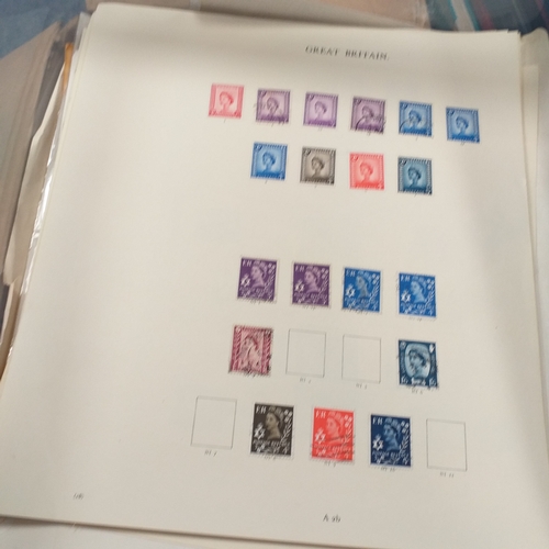31 - Box of album leaves - 100's mostly Commonwealth, some foreign - viewing required