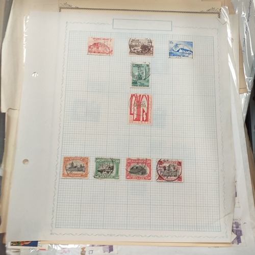 31 - Box of album leaves - 100's mostly Commonwealth, some foreign - viewing required