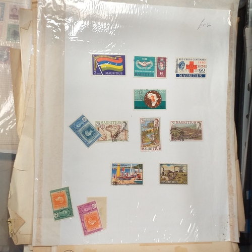 31 - Box of album leaves - 100's mostly Commonwealth, some foreign - viewing required