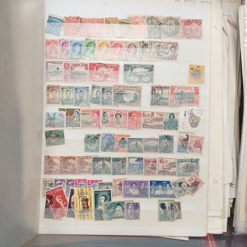 31 - Box of album leaves - 100's mostly Commonwealth, some foreign - viewing required