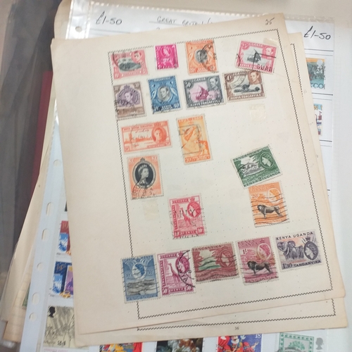 31 - Box of album leaves - 100's mostly Commonwealth, some foreign - viewing required