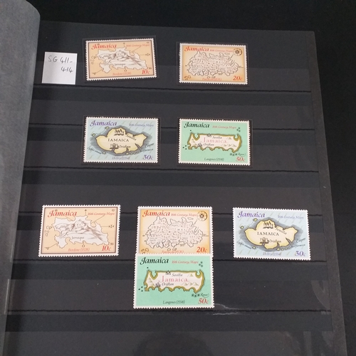 12 - Box: 6 Stock books and albums, contain collections from Jamaica, Malaysia, Football thematics and 2 ... 