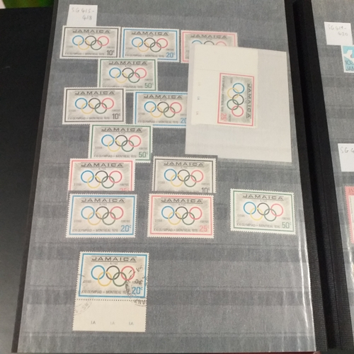 12 - Box: 6 Stock books and albums, contain collections from Jamaica, Malaysia, Football thematics and 2 ... 