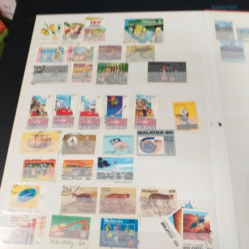 12 - Box: 6 Stock books and albums, contain collections from Jamaica, Malaysia, Football thematics and 2 ... 