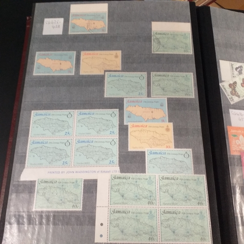 12 - Box: 6 Stock books and albums, contain collections from Jamaica, Malaysia, Football thematics and 2 ... 